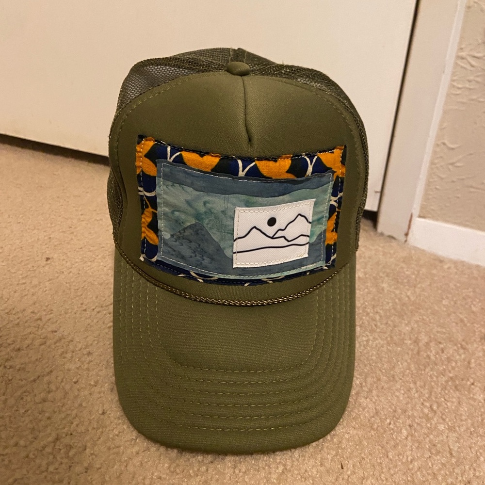 HEC studio trucker hat with custom one of a kind design, green